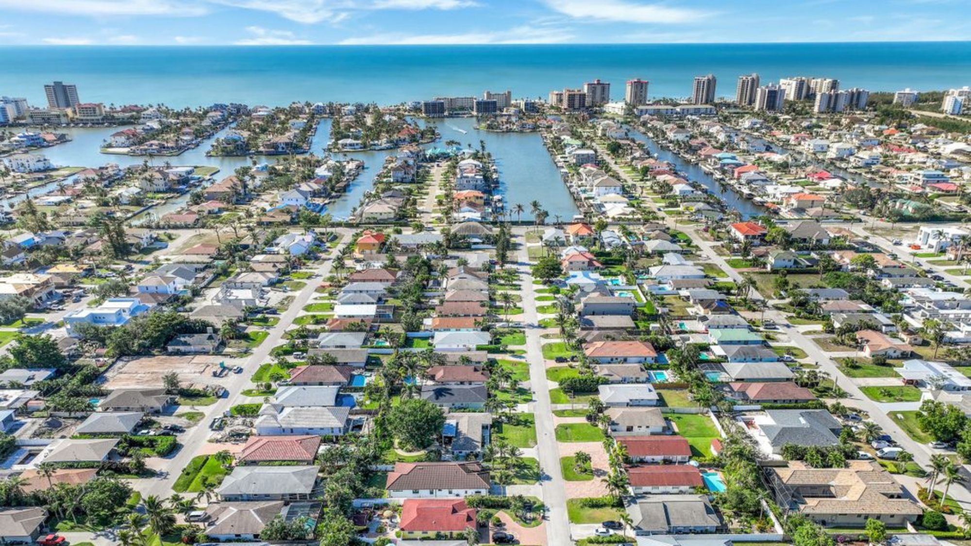 Southwest Florida waterfront neighborhood with single-family homes owned by out-of-state property sellers